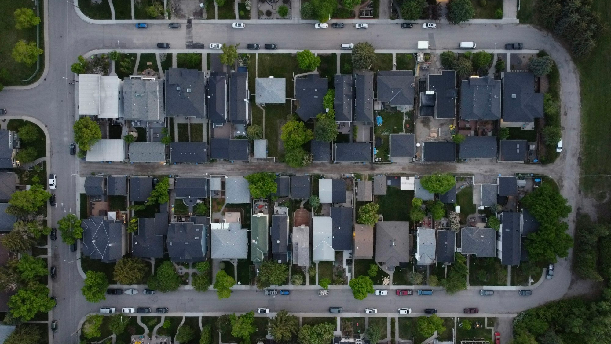 Overhead view of a block of new homes along neighborhood streets