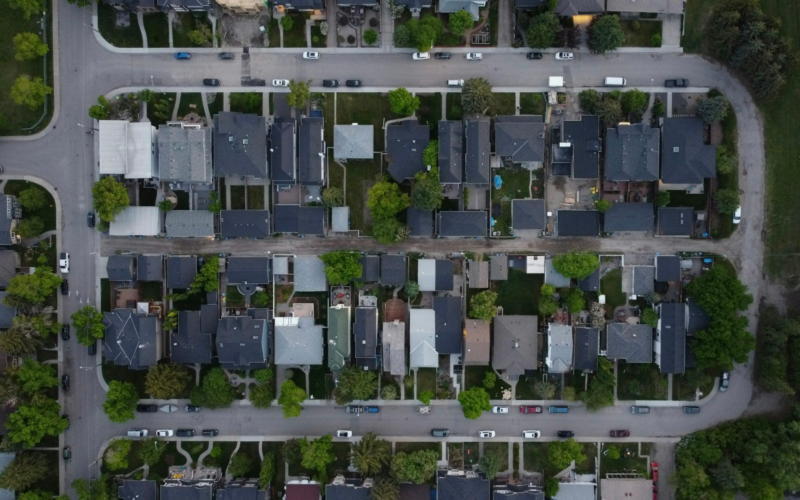 Overhead view of a block of new homes along neighborhood streets